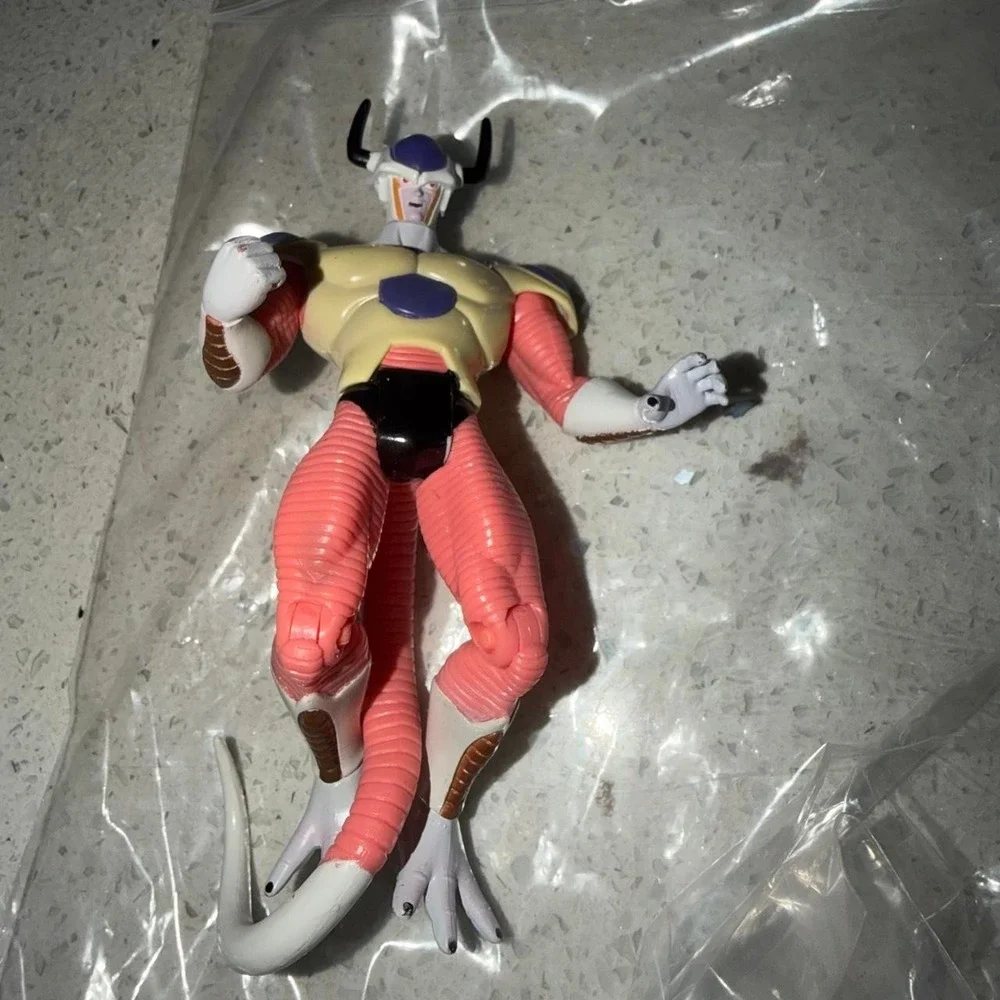 Dragon Ball Z Frieza action figure with pink, beige, and white color scheme